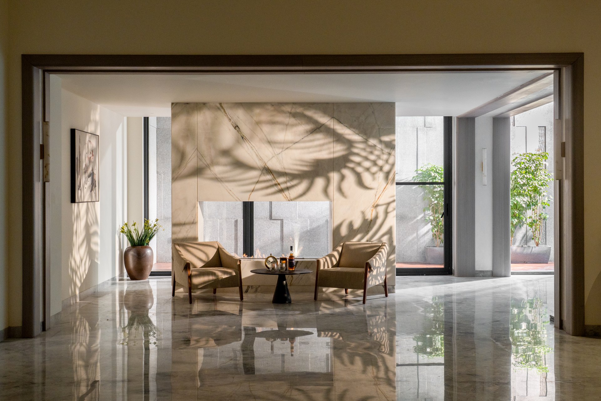 Completed interior with polished stone floors and natural light