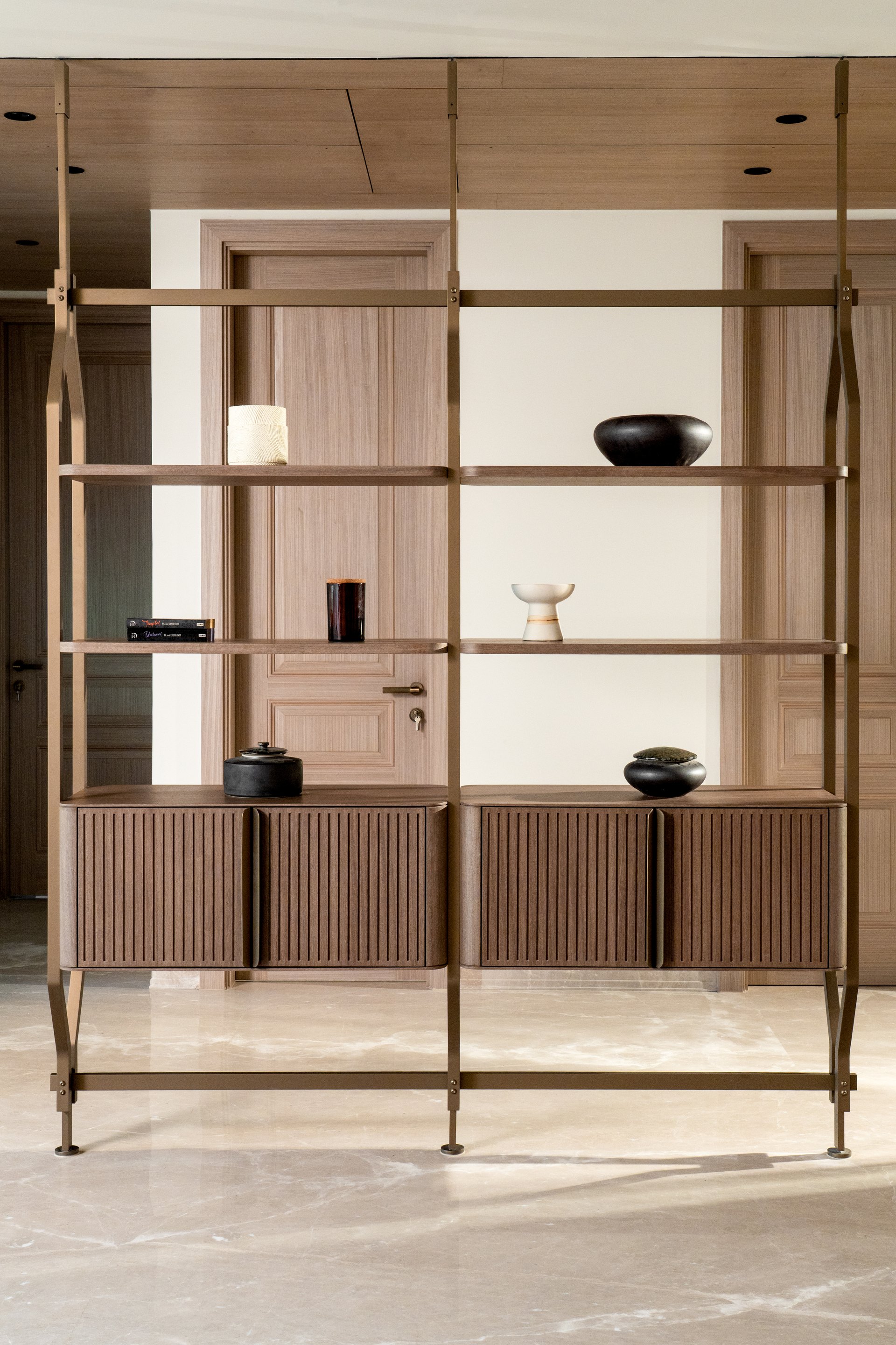 Bespoke open storage with fluted cabinetry and refined metalwork